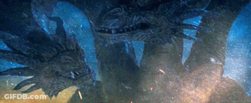 Monster With Many Arms And Large Head GIF