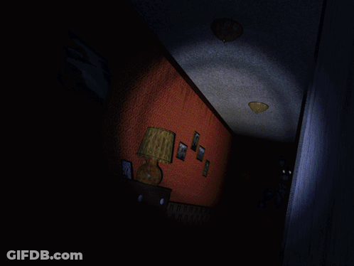 Monster With Red Eyes And Sharp Teeth In Doorway GIF
