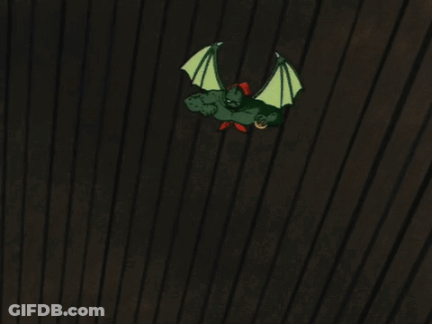 Monster With Wings Holding Something GIF