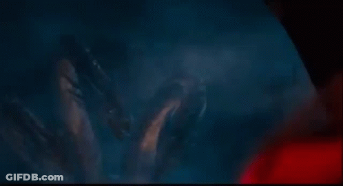 Monsters Standing In Dark Looking At Camera GIF