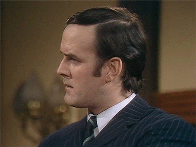 Monty Python John Cleese Confused GIF