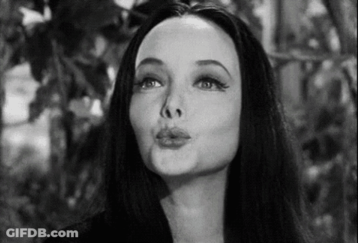 Morticia Kisses GIF