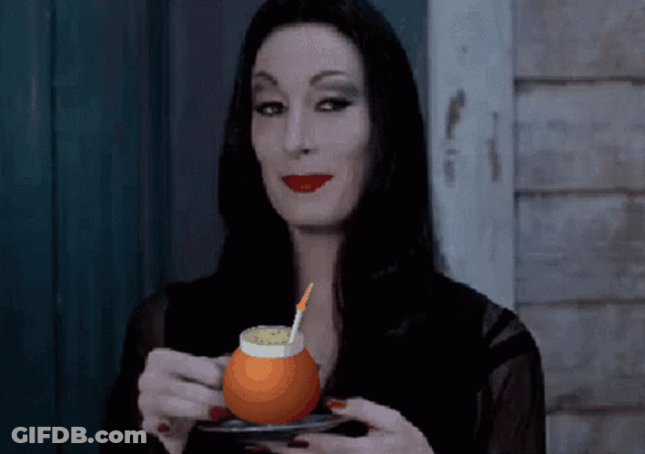 Mortician Adams Sips Tea GIF