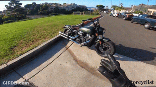 Motorcycle Parked Beside Glove Saying Motorcyclist GIF
