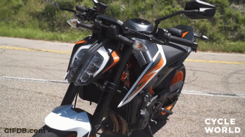 Motorcycle Parked On Road With Cycle World GIF