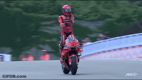 Motorcycle Racer In Red Ducati Outfit GIF