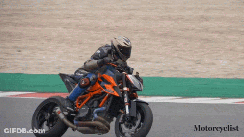 Motorcyclist Riding Motorcycle On Track GIF