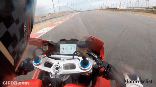 Motorcyclist Riding Red Motorcycle GIF