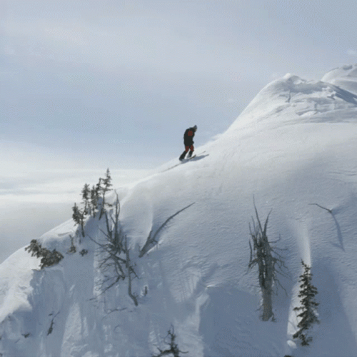 Mountain Climbers On A Winter Season GIF