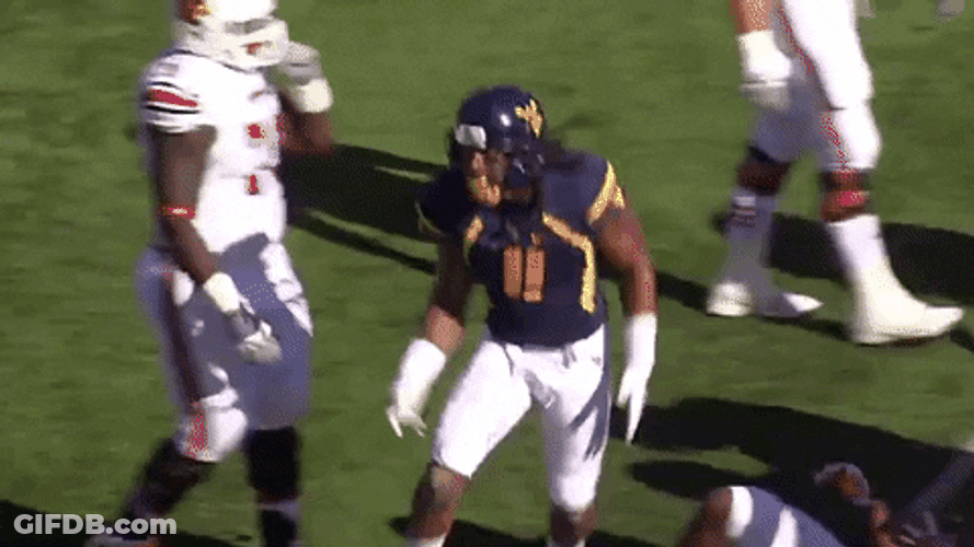 Mountaineers Players Doing Chest Bump GIF