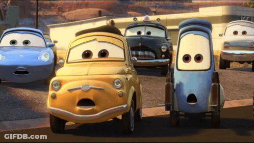 Movie Cars Lined Up On Road GIF
