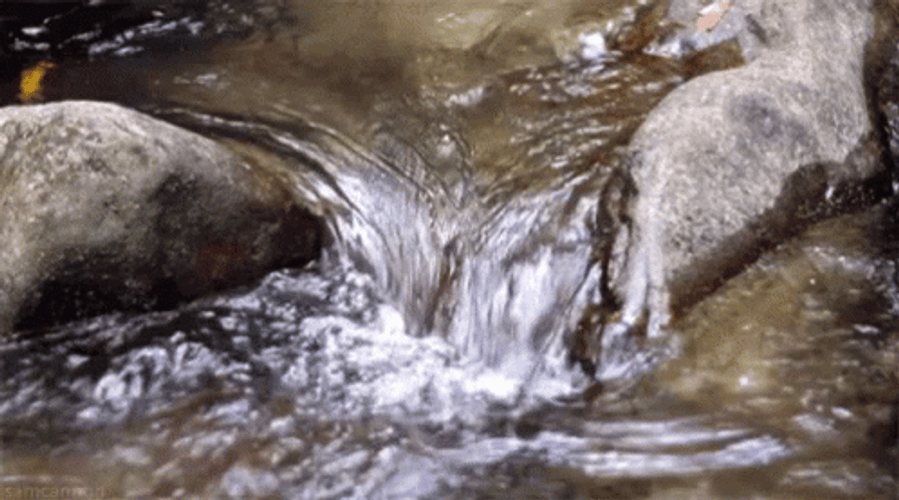 Moving Water Through The Rocks GIF