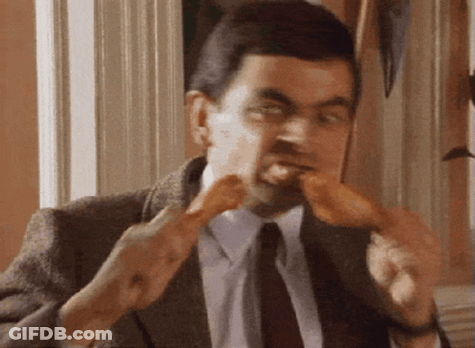 Mr. Bean Eating Chicken Wing GIF