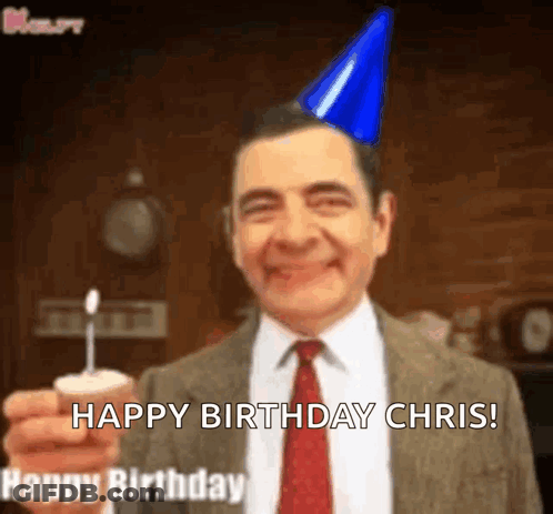 Mr Bean In Party Hat Holding Candle GIF