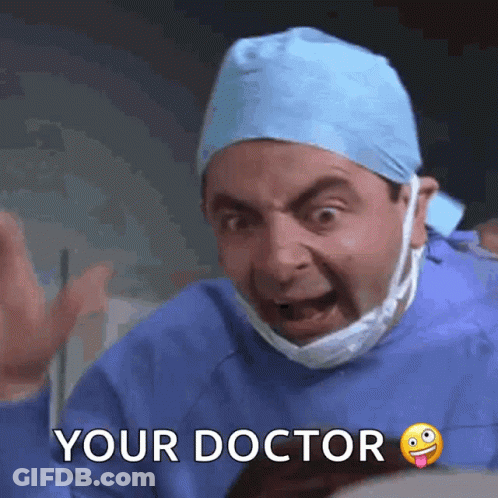 Mr Bean In Surgical Gown And Mask Saying Your Doctor GIF
