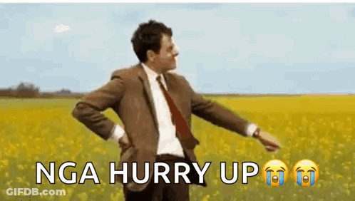 Mr Bean Is Dancing In A Field Of Yellow Flowers . GIF