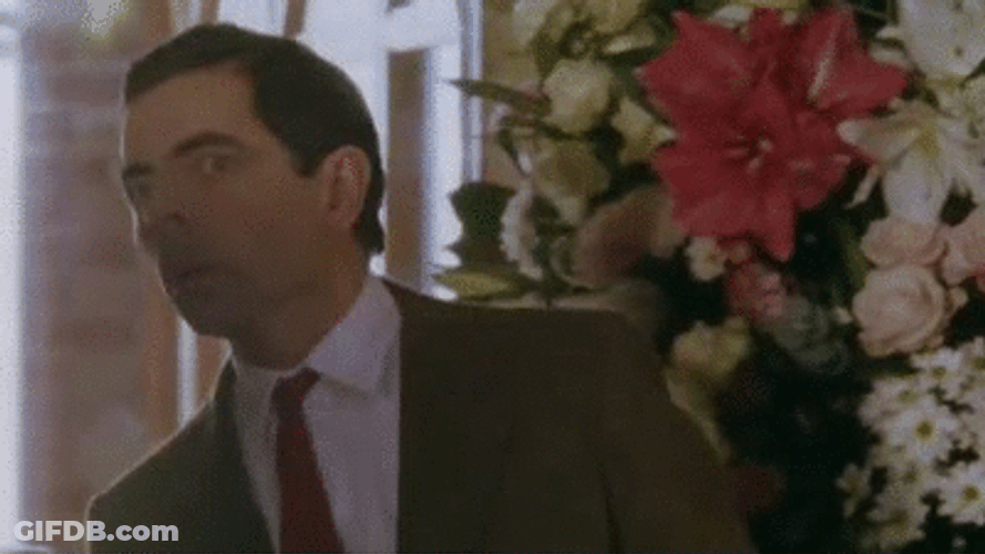 Mr. Bean Looking Around Searching GIF