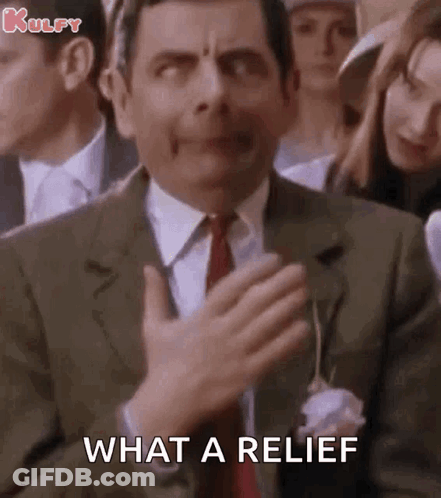 Mr Bean Making Funny Face Saying What GIF