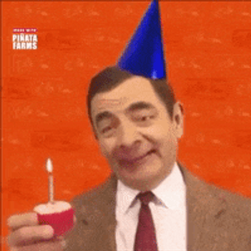 Mr. Bean's Weird Way Of Blowing Birthday Candle GIF