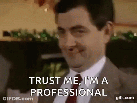 Mr Bean Smiling Saying Trust Me I'm A Professional GIF