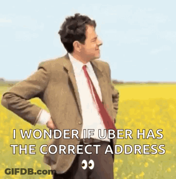 Mr Bean Standing In Field Wondering About Uber Address GIF