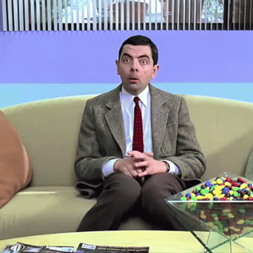 Mr Bean Waiting On Couch GIF