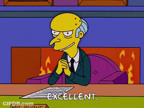 Mr. Burns From The Simpsons Is Sitting At A Table With A Piece Of Paper In Front Of Him . GIF