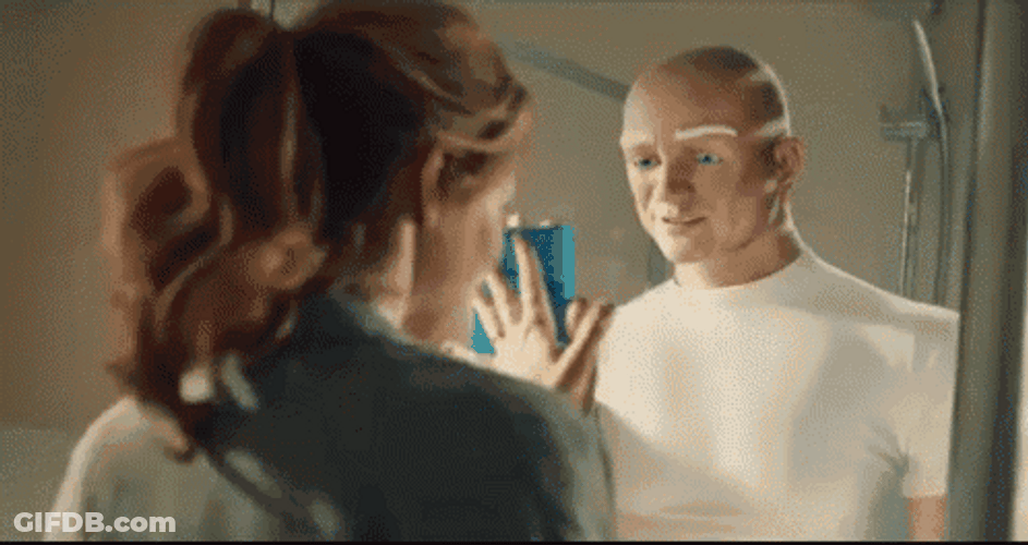 Mr Clean And Woman Wiping Mirror GIF
