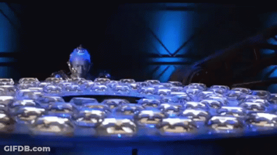 Mr Freeze Preparing Frozen Bombs GIF