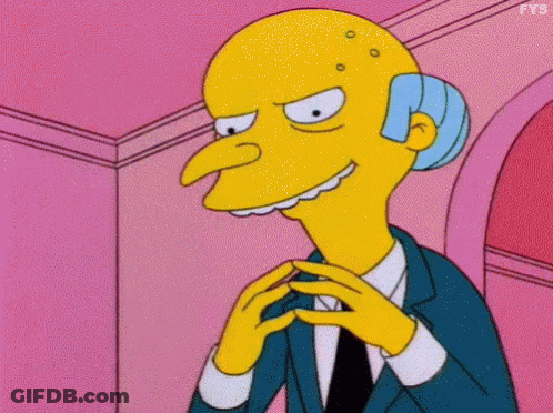 Mr. Simpson From The Simpsons Is Wearing A Suit And Tie And Making A Funny Face GIF