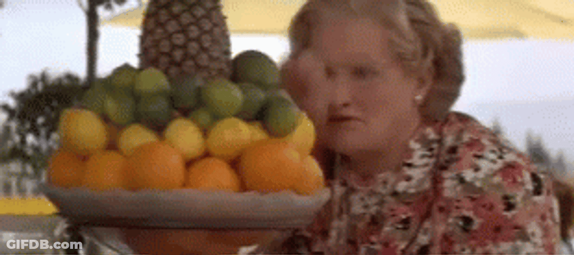 Mrs Doubtfire Throws Fruit On Pierce Brosnan GIF