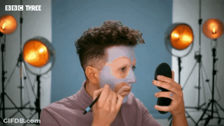 Mua Applies Foundation On Face GIF