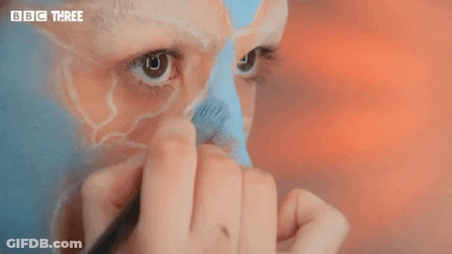 Mua Puts Blue Make Up Face Paint GIF