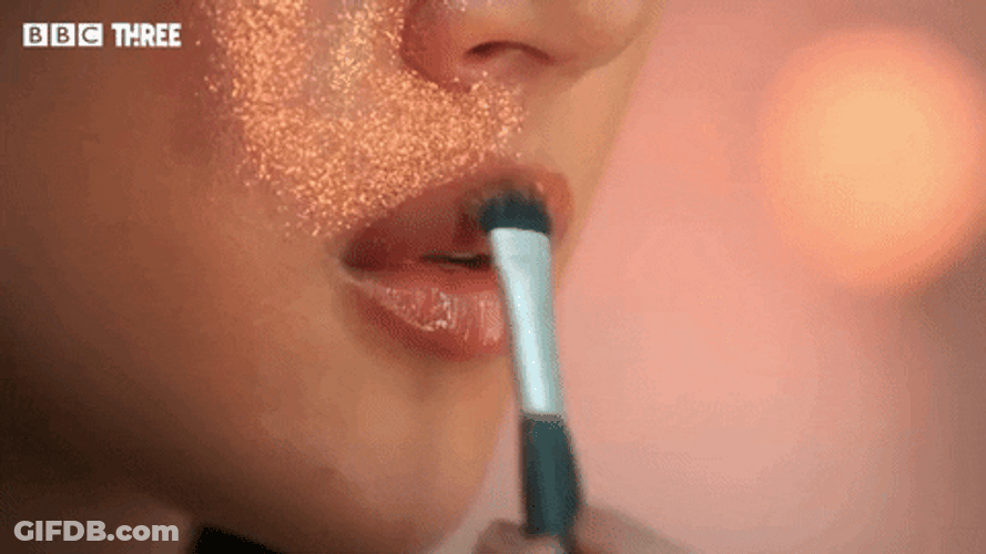 Mua Puts Glitter On Lips GIF