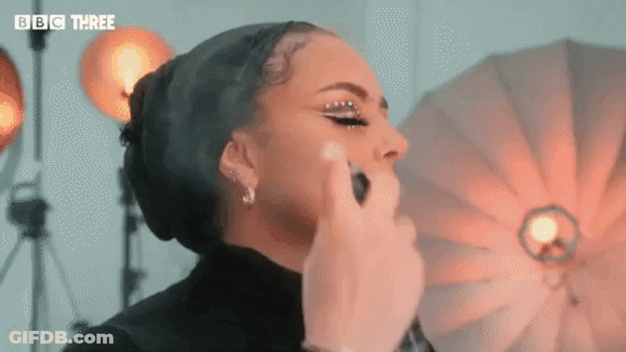 Mua Sprays Face With Setting Spray GIF