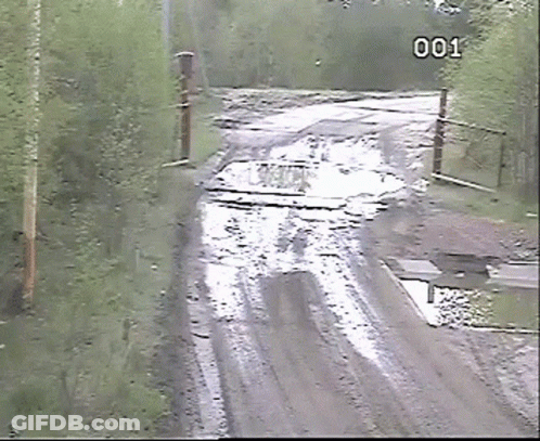 Muddy Road With Number 001 GIF