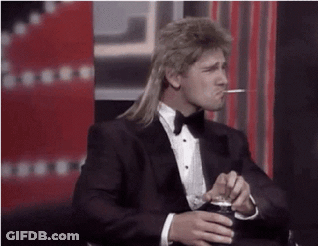 Mullet Haired Eric Bana Smoking GIF