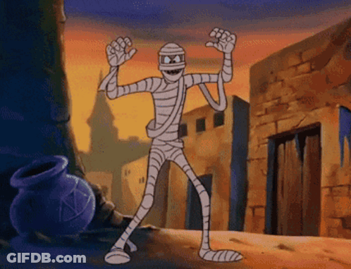 Mummy Dancing In Front Of Brick Building GIF