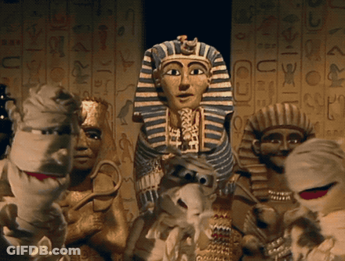 Mummy Puppets With Egyptian Writing GIF