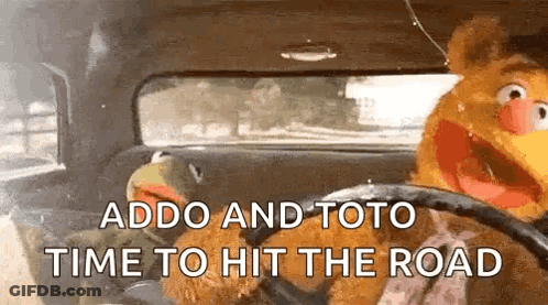 Muppets Are Driving A Car With The Words Addo And Toto Time To Hit The Road Written On The Screen . GIF