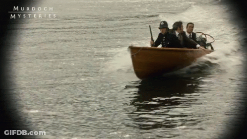 Murdoch Mysteries Poster Boat With Two Men GIF