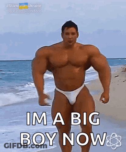 Muscular Man In Bikini On Beach GIF