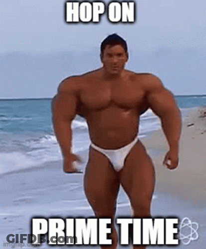 Muscular Man In Bikini Standing On Beach GIF
