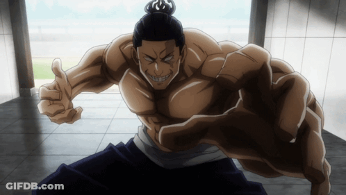 Muscular Man With Bun Giving Thumbs Up GIF