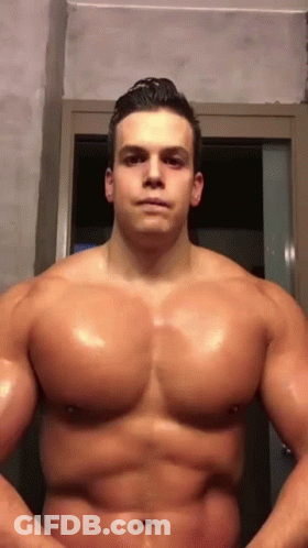 Muscular Man Without Shirt In Mirror GIF