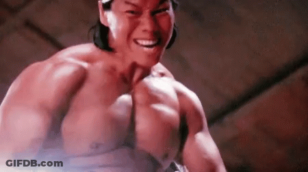Muscular Shirtless Man Smiling At Camera GIF