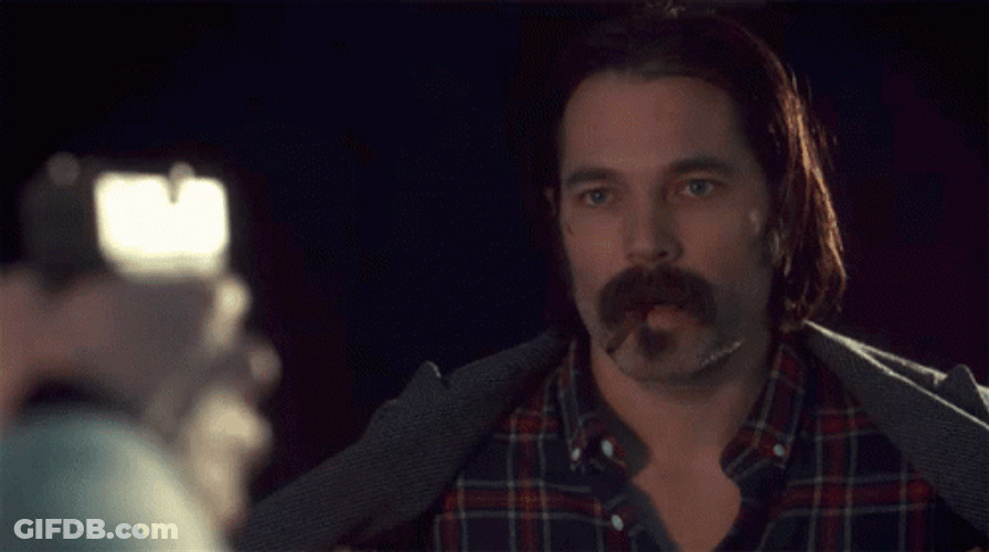 Mustached Guy Doc Holliday Smoking Tobacco GIF