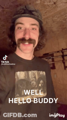 Mustached Man Black Shirt Saying Well Hello Buddy GIF