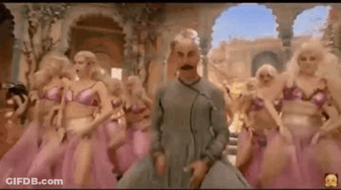 Mustached Man Dancing With Women In Pink Dresses GIF