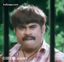 Mustached Man Funny Face Behind Bars GIF